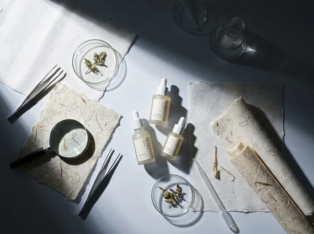 A sterile but organic laboratory environment where traditional hanji paper meets modern scientific observation