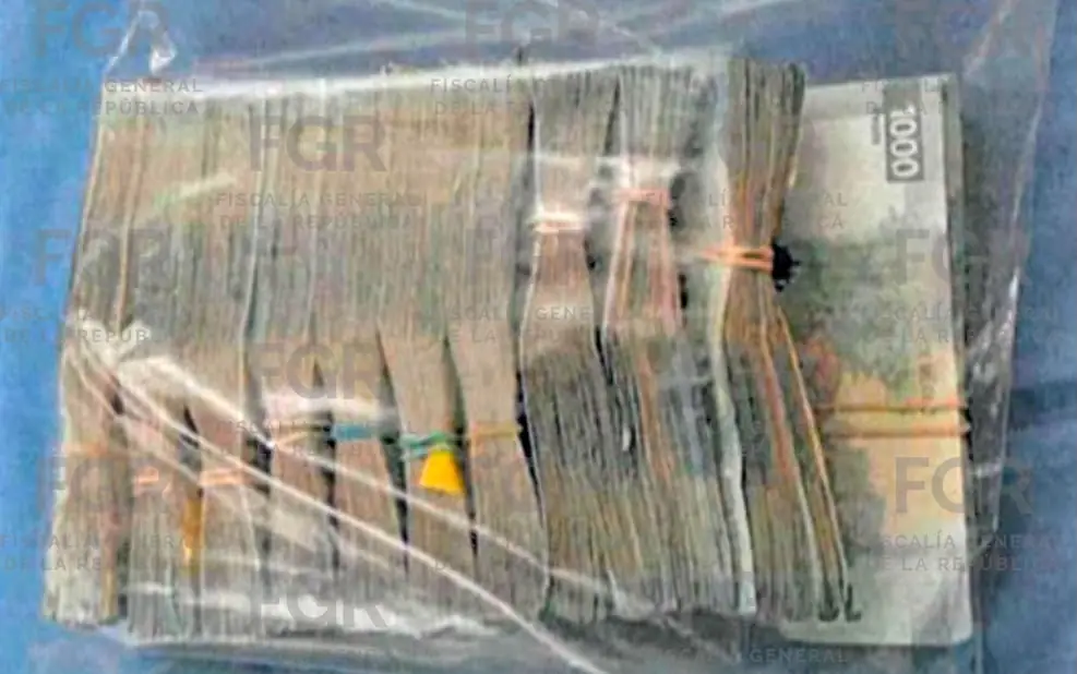 Detienen a René "N" con medio millón de pesos.