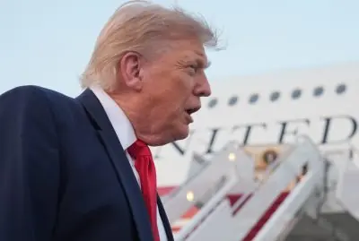 Trump conversa con Burnham.