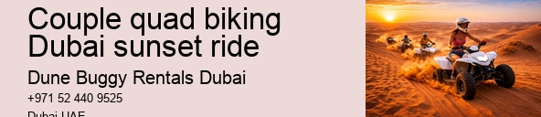 Couple quad biking Dubai sunset ride