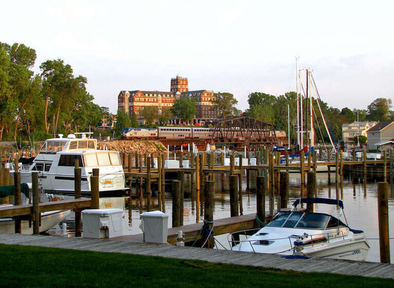 A 30 minute late P370 crosses the St. Joseph River just prior to sunset on a hot and muggy may night.