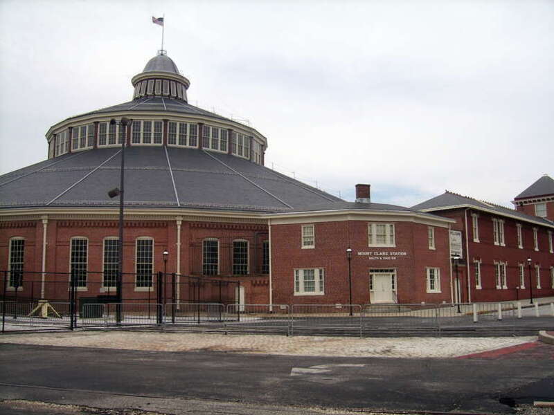 Mount Clare Station and Rundhouse. Mount Clare Station opened in 1830 by the Baltimore &amp; Ohio Railroad - first railroad station in US. The current structure dates from 1851. The adjacent roundhouse designed by Ephraim Francis Baldwin was built in