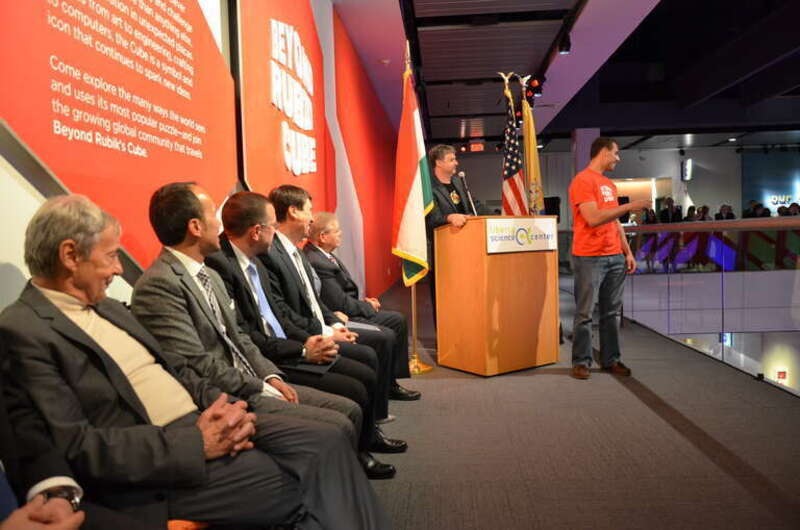 Liberty Science Center CEO, Paul Hoffman, speedcuber Anthony Brooks, Budapest inventor Erno Rubik, NJ Lt. Gov. Kim Guadagno, US Senator Robert Menendez, and Hungarian President Janos Ader at the opening of the Beyond Rubik's Cube museum exhibition.