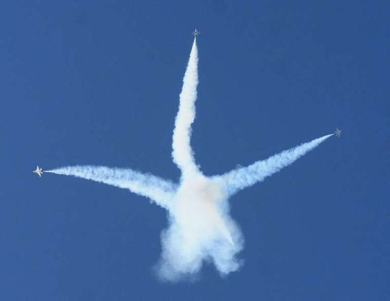 "Bomb burst" formation of United States Air Force Thunderbirds at the dedication of the United States Air Force Memorial located in Arlington County, Virginia.