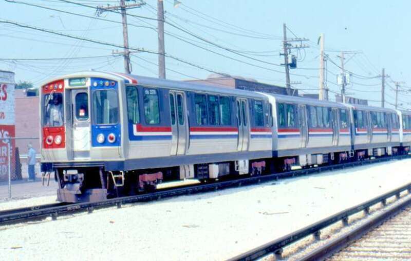 CTA Boeing-Vertol car 2579 (1976-78) leads eb Douglas-Milwaukee train @49th Av Cicero IL 7-24-81