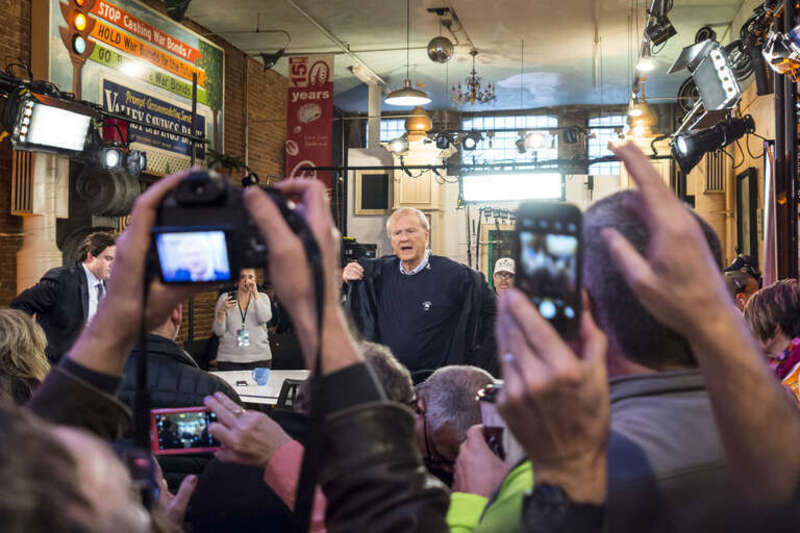 People grab shots of MSNBC's Chris Matthews as his show Hardball prepares to go on the air from Java Joe's coffee shop.

Photos from around Des Moines on the eve of the Iowa caucuses.
