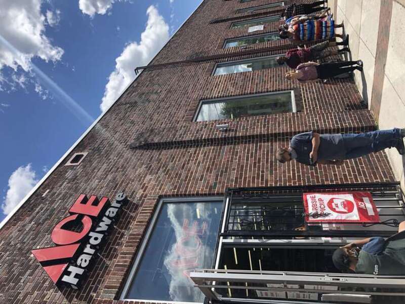 Customers waiting outside ACE Hardware in Baltimore, MD on May 31, 2020 using social distancing practices during the COVID-19 pandemic.