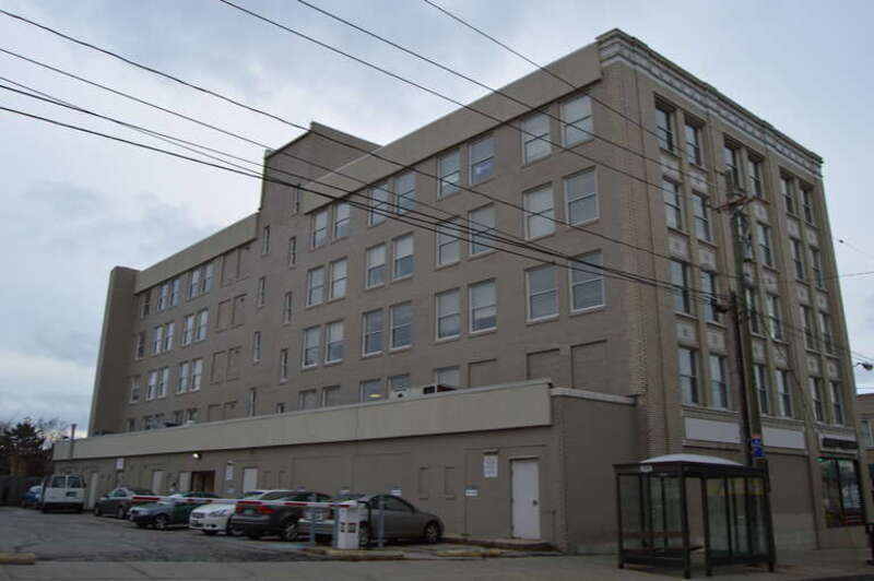 Eastern front and rear of the Detroit-Warren Building, located at 14801-14813 Detroit Avenue in Lakewood, Ohio, United States.  Built in 1923, it is listed on the National Register of Historic Places.