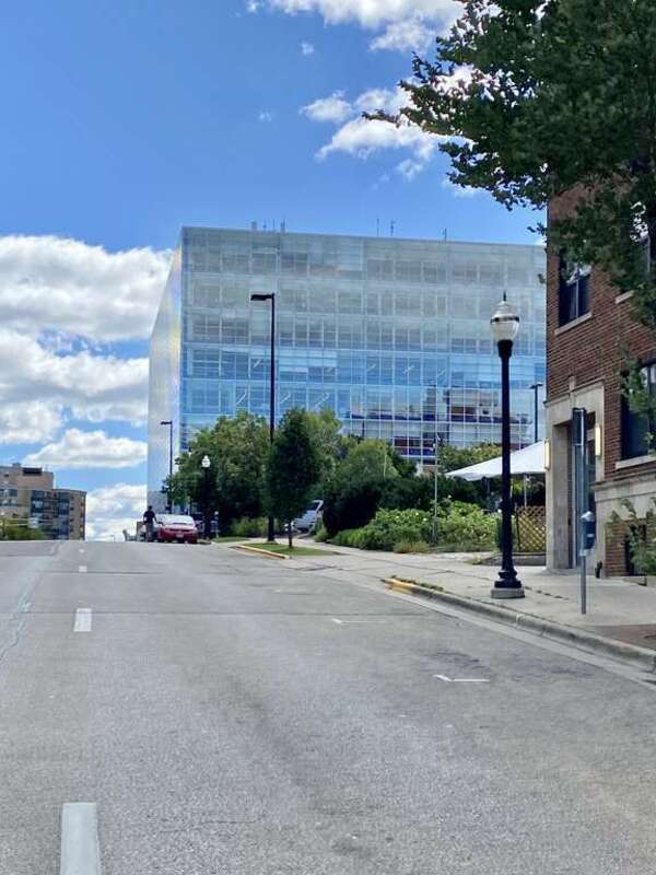 Built in 1974, this Modern building was designed by Bruce Graham and Skidmore, Owings and Merrill (SOM) to house the offices of First Wisconsin Bank, though it now houses US Bank.  The building is clad in glass with a geometric massing made up of