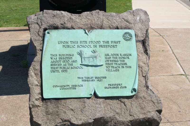 First School in Freeport, NY Plaque. Located at corner of North Main Street and Church Street, in front of the Cannon.