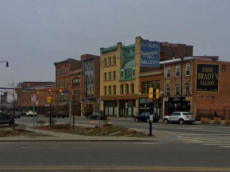 As seen in January 2020, the "Genesee Gateway" is the name that's been given to a row of buildings on the south side of Genesee Street between Ellicott and Oak Streets in downtown Buffalo, representing an unusually intact streetscape of 19th-century