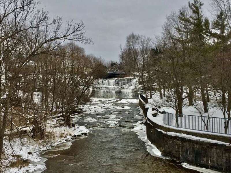 A wintertime view of Williamsville, New York's lovely Glen Falls, as seen from the parking lot along Glen Avenue in February 2021.