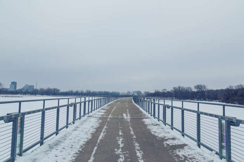 Kruidenier Trail along a pedestrian bridge over Grays Lake in Des Moines, Iowa.