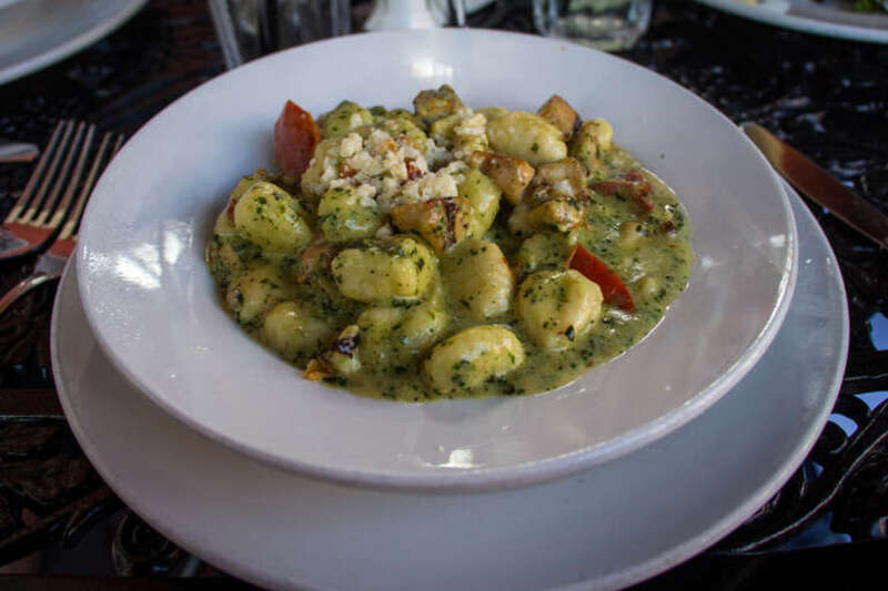 My entree at Ralph Brennan's Jazz Kitchen: Grilled Chicken &amp; Gnocchi Pesto
Potato dumplings, oven roasted tomatoes, creamy pesto sauce, shaved Asiago cheese.