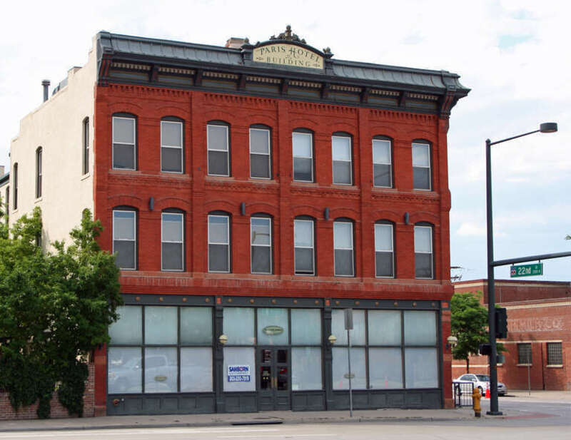 The George Hamburger Block, located at 2199 Arapahoe Street in Denver, Colorado. A sign at the top of the structure reads, "Paris Hotel Building."