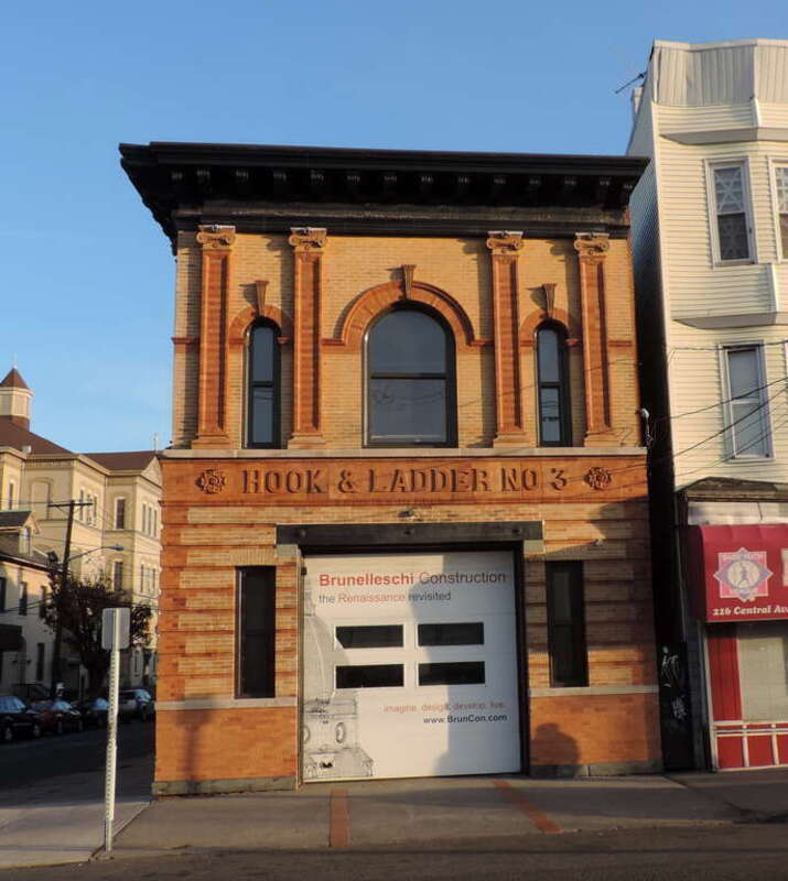 Looking east across Central Avenue at Hook # Ladder No 3 house, late on a sunny day