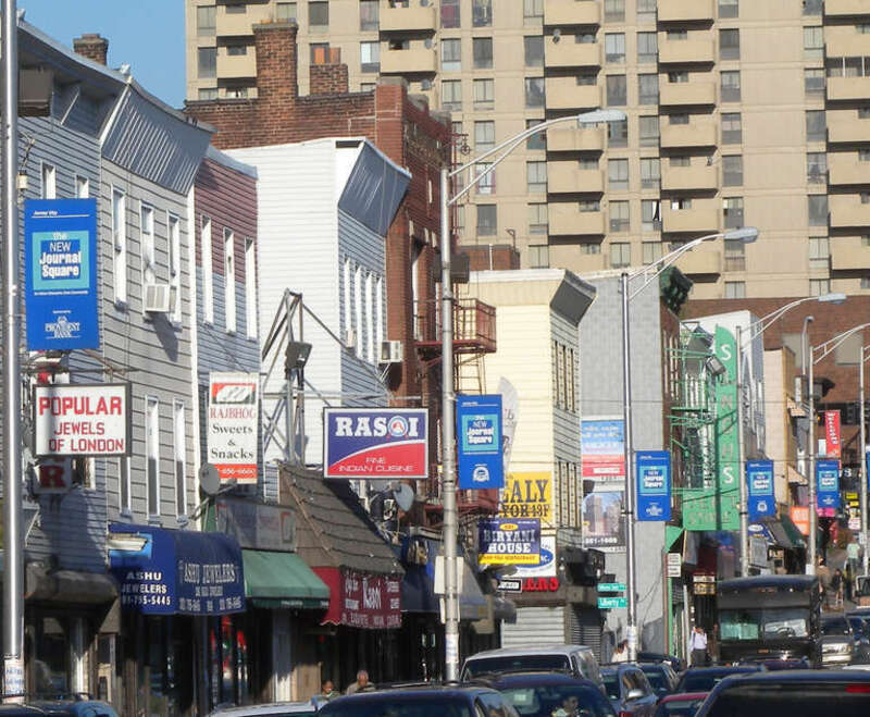 Looking east along Newark Street (India Square) towards JFK Blvd on a sunny late afternoon.