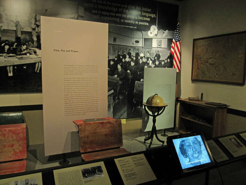 In the latter parts of the 19th century the United States Bureau of Indian Affairs established Indian Schools, in hopes of "taming" the "savage" Native Americans by teaching them English, white American culture, and Christianity. 

Many Native