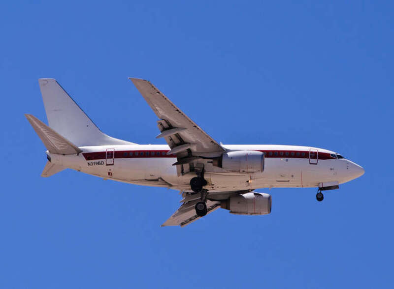 This 2001-vintage Boeing 737 is in service with JANET, a US Air Force "airline" that is in charge of ferrying workers between their jobs at Groom Lake ("Area 51") and their homes in Las Vegas. The JANET fleet, distinguished by a plain white livery