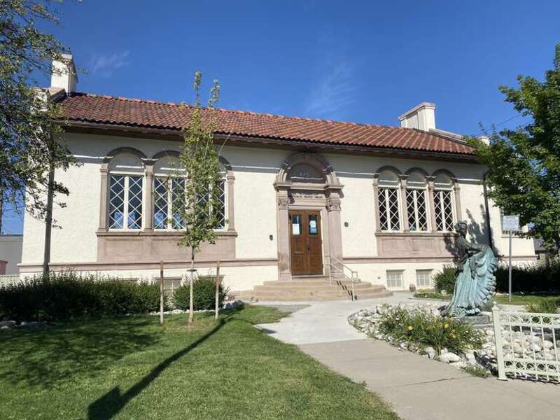 The exterior of the John "Thunderbird Man" Emhoolah, Jr. Branch Library in Denver, Colorado, in 2022. The building is a Carnegie library that was renamed in 2021.