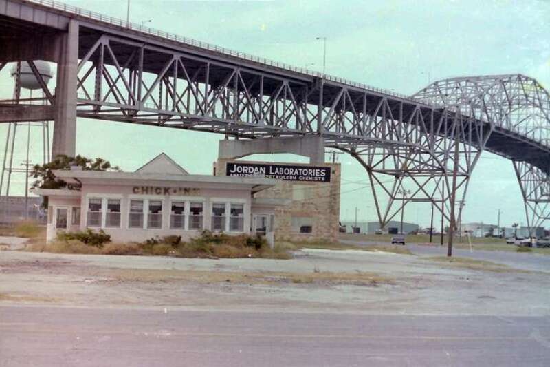 These two buildings were in the shadows of the harbor bridge in the late 1970's.  I think Jordan Laboratories was still in business then, but the Chick Inn  restaurant had been abandoned for a number of years.
