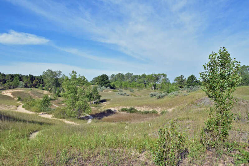 Cordwalk trail allows access to Sand Dunes and views of Lake Michigan at Kohler-Andrae State Park Wisconsin