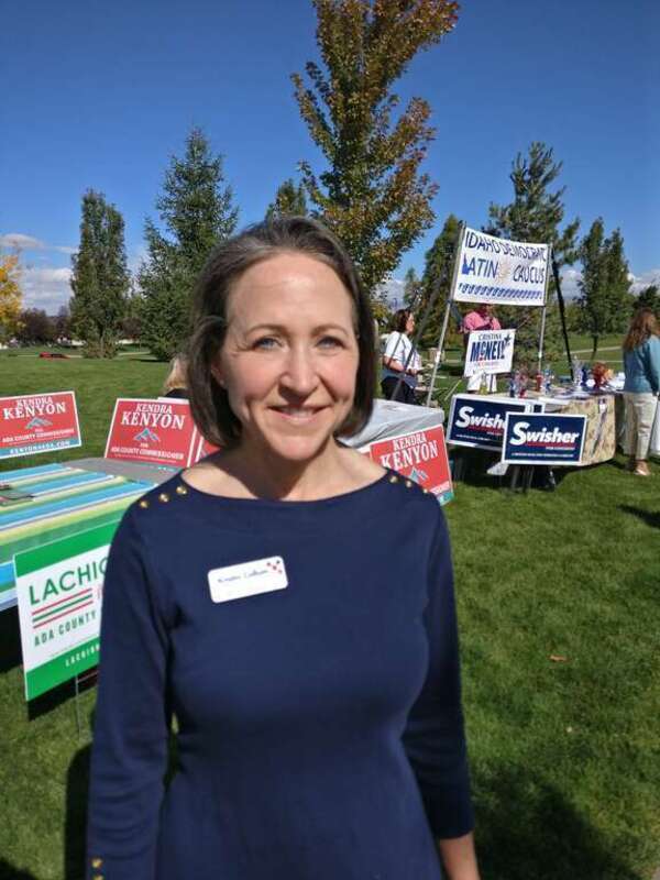 Democratic candidate for Idaho Lt. Gov. Kristin Collum at Harvesting Change -A Progressive County Festival, a big tent event held at Julius M. Kleiner Memorial Park in Meridian, Idaho on September 30, 2018. In the background are booths for candidates