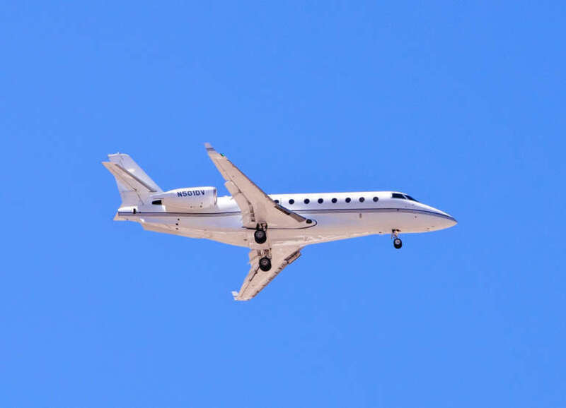 This is a fairly new (built 2008) Gulfstream G200 that is registered to LA Fitness in Irvine, California.
Aircraft is landing on Runway 1L at McCarran International Airport, Las Vegas. I am at the Silverton Lodge &amp; Casino parking area, which is