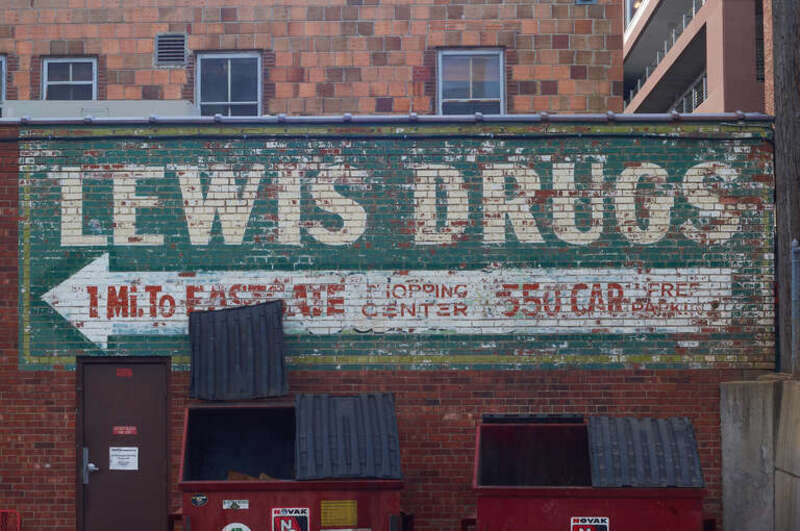 I don't know how old this ghost ad is, but I've always glanced at it as I pass by. It is downtown, right behind the Minervas resturant in the alley. It reminds me a little of the Wall Drug signs that dot I90 as I drive west. A few early morning
