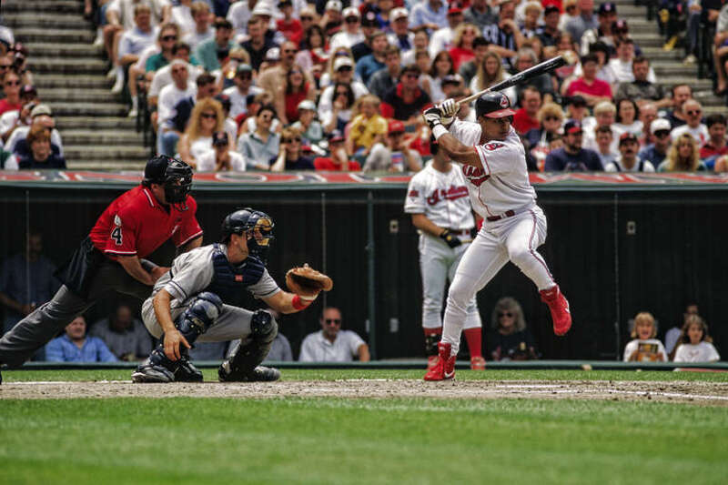 Manny Ramirez of the Cleveland Indians at bat against the California Angels in a game at Jacobs Field on June 8, 1996