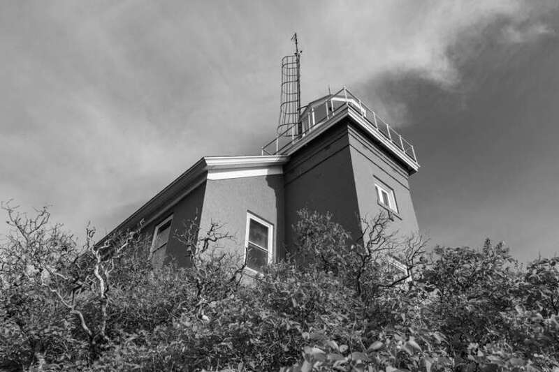 Marquette Harbor Light, Marquette, Michigan. Built: 1865. "Construction of the current structure began in 1865. The 11⁄2-story dwelling shares its design with the lighthouses on Granite Island, Gull Rock and Huron Island. It includes a set of