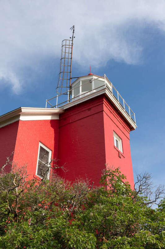 Marquette Harbor Light, Marquette, Michigan. Built: 1865. "Construction of the current structure began in 1865. The 11⁄2-story dwelling shares its design with the lighthouses on Granite Island, Gull Rock and Huron Island. It includes a set of