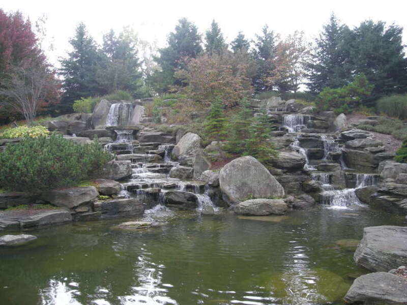 The waterfall in the Sculpture Park at the Frederik Meijer Gardens &amp; Sculpture Park in Grand Rapids Township, Michigan (United States).