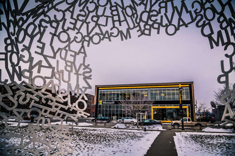 The Microsoft Store and Locust Street as seen from inside Jaume Plensa's "Nomade" at the Pappajohn Sculpture Park in Des Moines, Iowa.