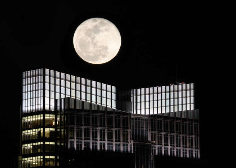 Took this from Montgomery Plaza.   I had hoped to capture it over all of downtown.  By the time I got back to the Amon Carter, the moon was too high.  Had to rush to plan B.   

I did fudge a little on this image.  It was done with two exposures--One