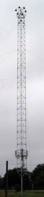 A moonlight tower located in Zilker Park, Austin, Texas, United States. This tower is a replica built in 1967 to replace one of the original 1895 towers that had fallen. This tower forms the "trunk" of the Zilker Tree, a 155 ft tall tree of lights