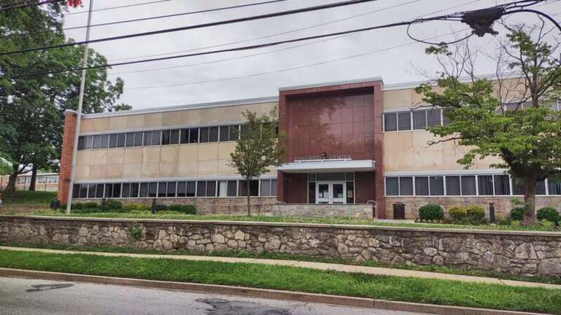 Looking northeast from North Columbus Avenue at Mount Vernon Schools headquarters on a cloudy afternoon