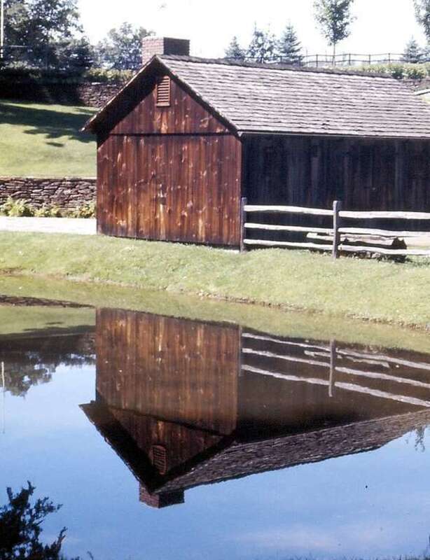 (1 in a multiple picture set)
While strolling throught the park one day (and it wasn't in the month of May), we found this quiet scene.  The water in the pond was perfectly still and the barn was relflected in total clarity.  A lovely place is
