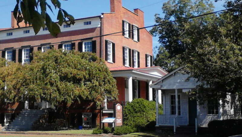 Riddick House  This photo shows Riddick's home and his small white office to the right.