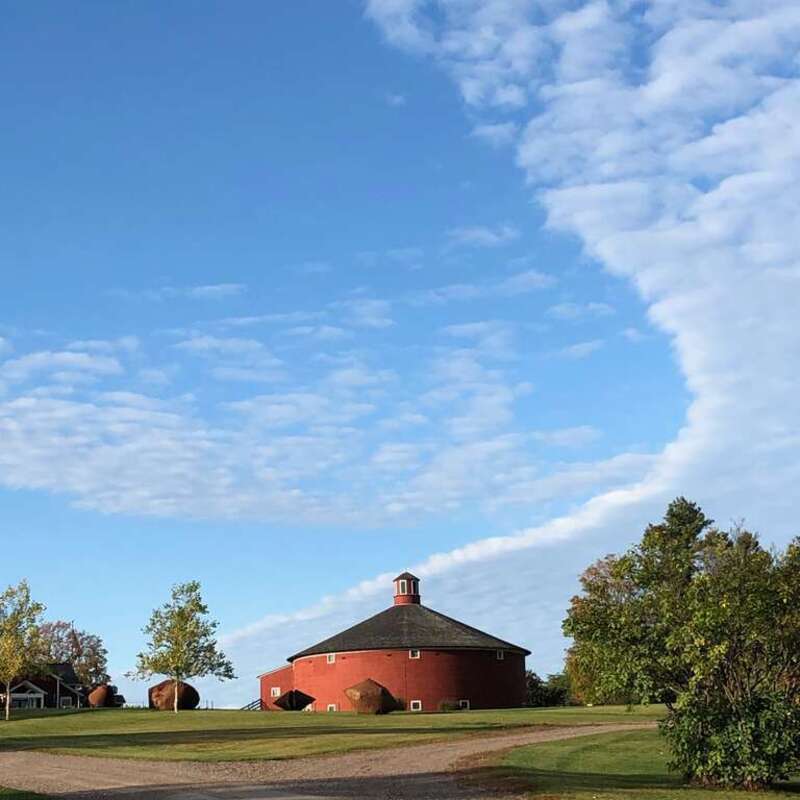 The Round Barn was originally constructed in East Passumpsic, VT in 1901 and was moved to the grounds of Shelburne Museum in 1985-1986. It is one of 39 exhibition buildings at the Museum.