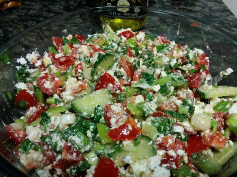 Shopska salad - made with tomatoes, cucumbers, sweet green peppers, green onion, Italian parsley, and Bulgarian feta.