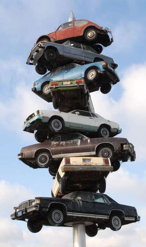 Artist Dustin Shuler's "Spindle" located in the parking lot of a Berwyn, IL strip mall in the Western suburbs of Chicago.