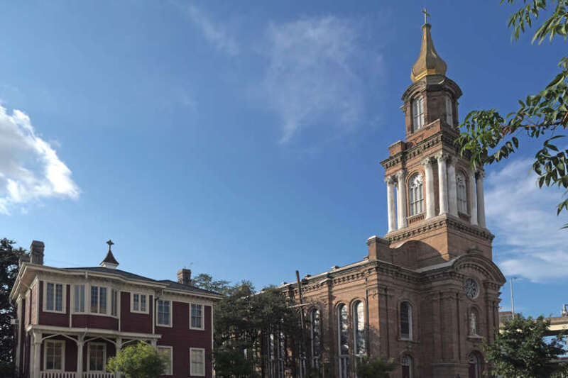 The distinctive gold steeple of St. John the Baptist Catholic Church has been a well-known landmark to residents of New Orleans for many years.