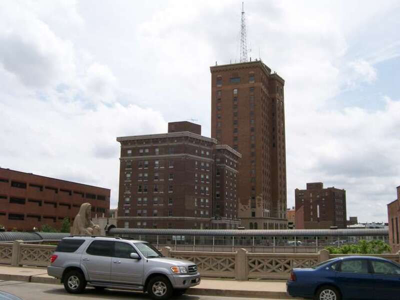 Stolp Island, Aurora, IL, from New York Street Bridge.  Memorial Bridge figure Memory at left.