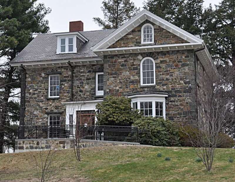 A photograph of the historic John Bottume House in Stoneham, Massachusetts, which serves as the Spot Pond Visitor's Center.