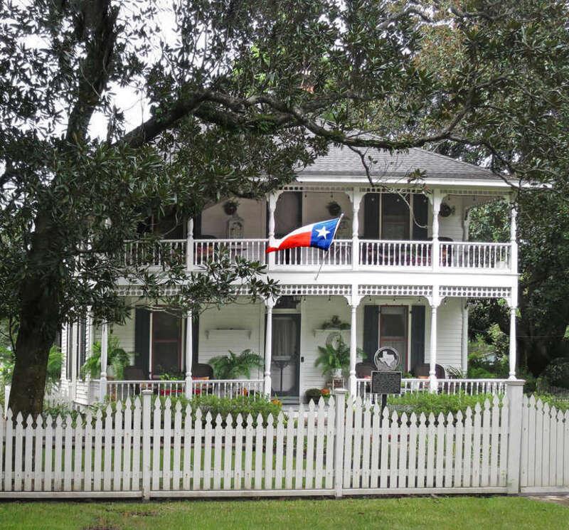 Thomas Jackson and Mary Lelia (Sherman) Dick lived on their north Galveston County "Buckhorn Ranch" for many years before hiring J. R. Beerwort and O. V. King to build this house in 1904. It is a good example of a two-story center passage plan with a