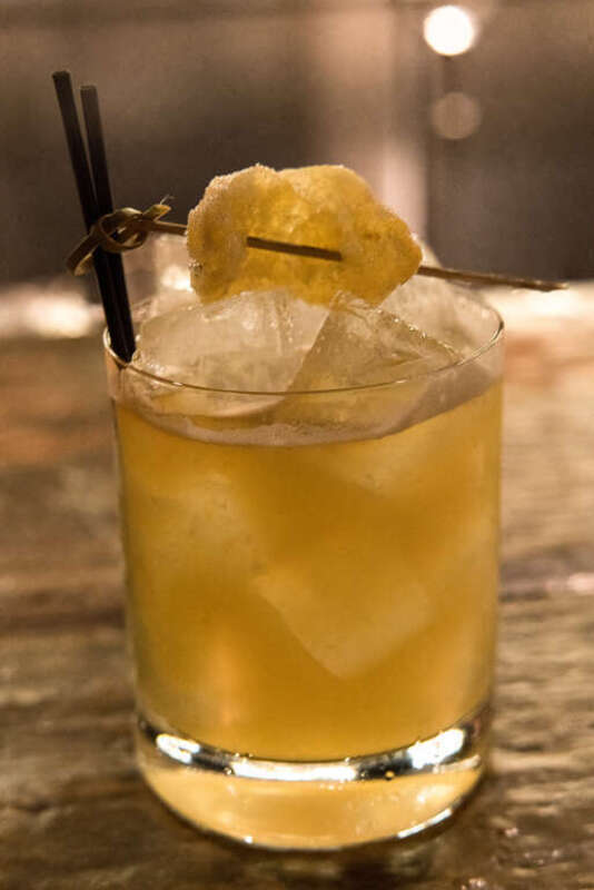 dewars “scratched cask” scotch; lemon; honey; ginger; ardbeg 10 scotch; candied ginger.