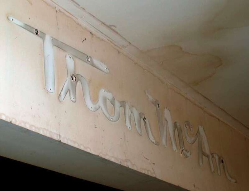 Label scar of a former Thom McAn shoe retail store at the now-closed Hawthorne Plaza in Hawthorne, California.  This store closed around 1992 along with many others when the company began downsizing in the early 1990's.  Remnants from this Thom McAn