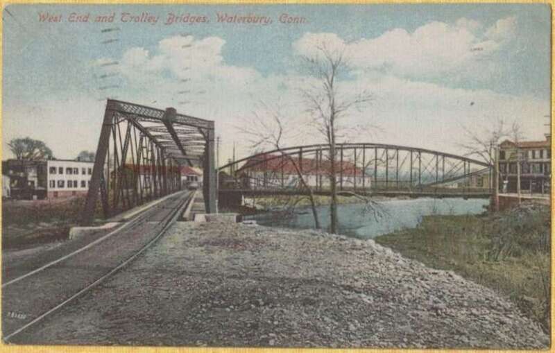Divided back postcard of the streetcar bridge across the Naugatuck River in Waterbury, postmarked 1913. The line was later rerouted over the West End bridge (West Main Street) in the background.