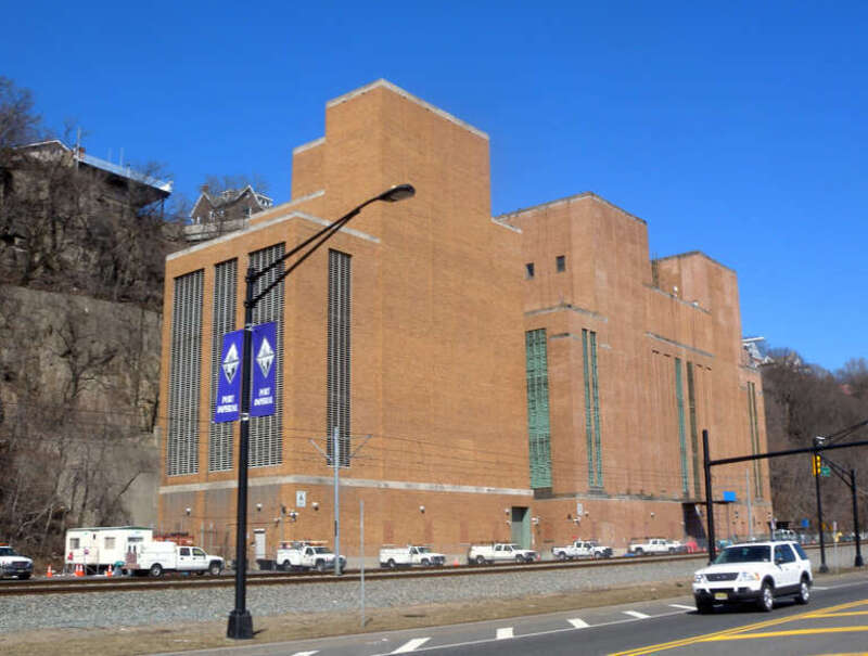 Looking northwest from River Road at Weehawken ventilation building for Lincoln Tunnel on a sunny late morning.